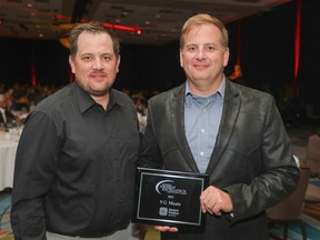 Kyle (left) and Cory Van Groningen of VG Meats received the Ron Usborne Award of Excellence from the 2022 Ontario Finest Meat Competition during a gala in Niagara Falls on October 15, 2022.