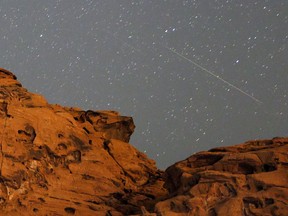 A pair of Perseid meteors streak over a sandstone outcropping at Redstone in the Pinto Valley wilderness area in the Lake Mead National Recreation Area in Nevada. The Brantford Public Library has resouces to help you explore the night sky. Ethan Miller/Getty Images