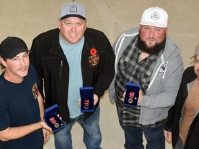 Decorations for Bravery, one of Canada's most respected and prestigious civilian honours, were recently presented to West Perth residents Trevor VanderHyden (left), Andrew Daub, Tim Harrison and Daryl Eckert. An incident at a Mitchell business, in February of 2016, saw two employees suffer carbon monoxide poisoning and these four pulled them to safety. ANDY BADER/MITCHELL ADVOCATE