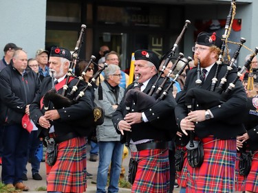 The Brockville Pipes and Drums march toward City Hall after the Remembrance Day ceremony. (RONALD ZAJAC/The Recorder and Times)