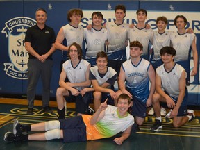 St. Mary Catholic High School is the Leeds Grenville senior boys volleyball champion for 2022. The Crusaders defeated Gananoque on their home court in Brockville in the local final on Wednesday. The St. Mary team includes (in front) John Huntley, (front row, from left) Declan Mulville, Reed Huntley, Augustus Curry, Gabe Osborne, (back row) coach Dennis Hutt, Kasey Jessome, Ben Brunton, Justin VanLuit, Peyton Veltkamp, Ty Chevrier and  Kristian Gibbs. Absent is Brody Liston.
Tim Ruhnke/The Recorder and Times/Postmedia Network



Lying down: John Huntley

Missing: Brody Liston