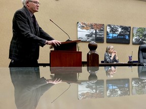 Bruce Hynes, chairman of the Marguerita Residence Corporation, speaks to Brockville council on Tuesday evening while city finance director Lynda Ferguson listens. (RONALD ZAJAC/The Recorder and Times)