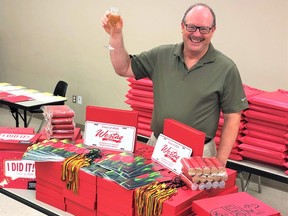 Ken McEwan, director of the Ridgetown Campus of the University of Guelph, shares a toast to the Class of 2020 while surrounded by special 'Congrat's in a Box' packages ready to be mailed to graduates. McEwan will receive the friend of agriculture award at the 2022 Rural Urban Awards Nov. 23. (Handout)