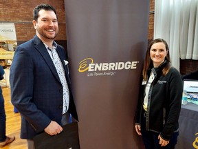 Spencer Pray, economic development officer, is seen here with Carolyn Schinkel, lead of talent acquistion at Enbridge Gas, during the Chatham-Kent Community Job Fair Tuesday at The Chatham Armory.  PHOTO Ellwood Shreve