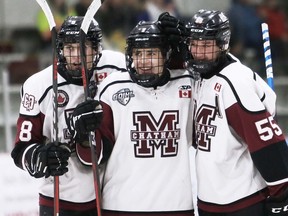 Chatham Maroons' Liam Doyle, centre, celebrates with Noah Mathieson, left, and Julien Gervais after scoring in the third period against the St. Thomas Stars at Chatham Memorial Arena in Chatham, Ont., on Sunday, Nov. 27, 2022. (Mark Malone/Chatham Daily News/Postmedia Network)