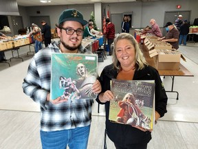 Chris Martin, 27, and his mom Toni Martin, were finding so many great records during Chatham Record Day on Saturday, they made a return trip. PHOTO Ellwood Shreve/Chatham Daily News