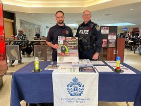 Cornwall Police Service Const. Patrick Huygen (left) and Sgt. Scott Coulter at the Crime Prevention Week display on Thursday, Nov. 10, 2022, at Cornwall Square. Todd Hambleton/Cornwall Standard-Freeholder/Postmedia Network