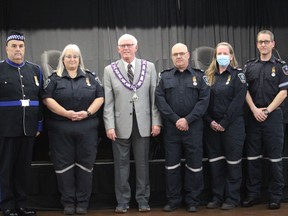 Paramedic medal recipients with Cornwall Mayor Glen Grant at the final council meeting of the 2018-2022 term are (from left) Scott Holiday, Carol Lavalliere, Randy Lalonde, Marie-Noel Larochelle and Eric Seguin. Absent from photo is Robert Lavigne. Photo on Monday, November 14, 2022, in Cornwall, Ont. Todd Hambleton/Cornwall Standard-Freeholder/Postmedia Network