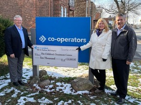 Sean Adams, of the Children's Treatment Centre, with CTC supporters Darlene and Bill McGimpsey. Photo on Thursday, November 24, 2022, in Cornwall, Ont. Todd Hambleton/Cornwall Standard-Freeholder/Postmedia Network