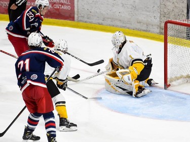 Cornwall Colts Ethan Montroy, left, shoots on Smiths Falls Bears goaltender Dawson Labre on Thursday November 3, 2022 in Cornwall, Ont. Cornwall lost 4-1. Robert Lefebvre/Special to the Cornwall Standard-Freeholder/Postmedia Network