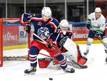 Cornwall Colts Alex Rossides and goaltender Dax Easter with their eye on the puck during play against the Hawkesbury Hawks on Thursday November 10, 2022 in Cornwall, Ont. Cornwall lost 7-6. Robert Lefebvre/Special to the Cornwall Standard-Freeholder/Postmedia Network