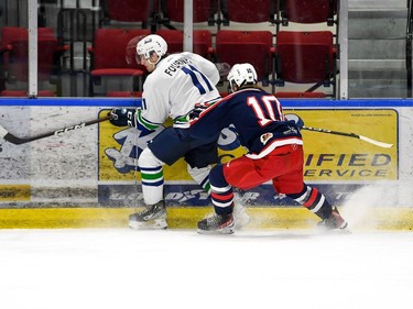 Cornwall Colts Tristan Miron takes Hawkesbury Hawks Alex Fournier into the boards on Thursday November 10, 2022 in Cornwall, Ont. Cornwall lost 7-6. Robert Lefebvre/Special to the Cornwall Standard-Freeholder/Postmedia Network