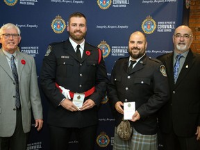 Handout/Cornwall Standard-Freeholder/Postmedia Network
From left, Cornwall police services board member Mayor Glen Grant, left, and board vice-chair Michel Payette, right, with the Preservation of Life recipients Const. Ryan Bradley, left, and Sgt. Shane Kelly, right, at the 27th-annual retirement and recognition evening held on Nov. 3, 2022.