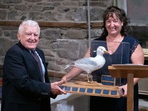 Handout/Cornwall Standard-Freeholder/Postmedia Network
The Stormont Yacht Club's commodore Natalie Bray, right, presents the 2022 Johnathan Seagull Award to Lloyd Chaput at the Past Commodore's Dinner held on Nov. 5, 2022, in St. Andrews West.