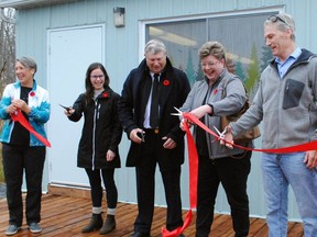 From left, Friends of Summerstown Trails volunteer and MC Mary Lou Leroux, MP Eric Duncan representative Rebecca Lance, South Glengarry Coun. Martin Lang, SDG Warden Carma Williams, and Friends vice-president Gilles Parisien officially opened the new storage and activity centre at the forest's trailhead on Sunday November 6, 2022 in Summerstown, Ont. Greg Peerenboom/Special to the Cornwall Standard-Freeholder/Postmedia Network