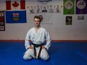 Kristian Nese poses for a portrait at Ippon Karate Dojo in Cochrane on Thursday, Nov. 3, 2022.