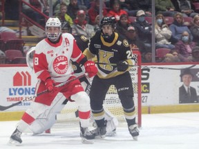 Soo Greyhounds forward Mark Duarte and Kingston  Frontenacs defenceman Alessandro Petreccia in first period OHL action at the GFL Memorial Gardens on Friday night. The Hounds dropped a 5-4 shootout decision to the Frontenacs.