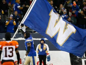Winnipeg Blue Bombers' Willie Jefferson (5) celebrates a win over the BC Lions in the CFL western final in Winnipeg, Sunday, Nov. 13, 2022.