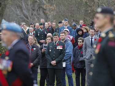 The crowd was larger and included students from John XXIII Catholic School to lead the crowd in singing the national anthem at the Matthew J Dawe Memorial Branch Remembrance Day cenotaph service in W. C Warnica Memorial Park in Kingston, Ont. on Friday, Nov. 11, 2022.
