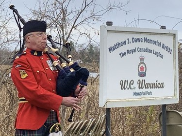 Piper Gordon Hagar played the Lament after the moment of silence at the Matthew J Dawe Memorial Branch Remembrance Day cenotaph service in W. C Warnica Memorial Park in Kingston, Ont. on Friday, Nov. 11, 2022.