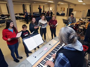 Students cycle through songs under the direction of vocal instructor Karen Sheffield during the Harmony Lounge and Music Club program at St. Magdalene's Anglican Church in Napanee on Nov. 8. From left to right: singers Julia Clair, Wyatt McKain, Peyton Denstedt, Lily Crozier and Charlotte Lalonde and guitarist Ethan Stein.