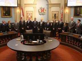 The newly sworn-in Kingston city councillors gather for a photograph at their inaugural council meeting on Nov. 22, 2022.