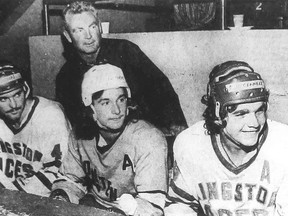 Kingston Canadians head scout Jim Tye, helps out as a coach during the OHA Major Junior A Hockey League team's 1974-75 training camp at the Memorial Centre on Sept. 3, 1974. Watching the play in front of Tye, from left, are defenceman Richie Dunn, centre Ken Linseman and defenceman Mike O'Connell. During the 1974-75 season, O'Connell, would post a seven-assist game, which remains the league record for a defenceman, on Nov. 17, 1974. He won the league's Max Kaminsky Trophy for most outstanding defenceman.