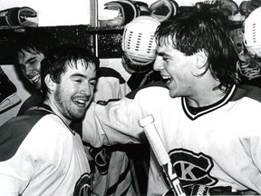 Kingston Canadians goaltender Chris Clifford, left, celebrates his goal, the first in Canadian Hockey League history by a goaltender, scored into the Toronto Marlboros net on Jan. 7, 1986. He's celebrating with Mike Maurice, who shielded a Toronto player from getting to the net and stopping Clifford's shot.