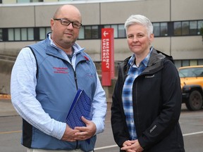 Dave Verch, first vice-president of the Ontario Council of Hospital Unions, and Shauna Dunn, president of OPSEU 462, the area paramedics union, spoke to Kingston media on Tuesday, Nov. 1, 2022, in front of the emergency entrance of Kingston General Hospital.