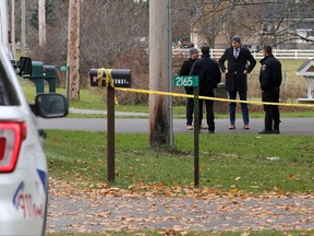 Kingston Police detectives and forensic officers gather outside a home on McKendry Road Tuesday morning, just south of Unity Road, after a sudden death took place in a home on Monday, Nov. 15, 2022. Ian MacAlpine/The Kingston Whig-Standard/Postmedia Network