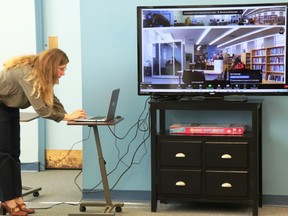 Gananoque Public Library personnel Pam Hudson setting up the Owl Pro unit for an upcoming meeting. This was one of a series of technological devices purchased by the library using a $29,500 Resilient Communities Fund grant received from the Ontario Trillium Foundation (OTF). Lorraine Payette/for Postmedia Network