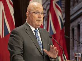 Steve Clark, Ontario's Minister of Municipal Affairs and Housing speaks to journalists at the Queens Park Legislature, in Toronto on Wednesday, November 16, 2022.