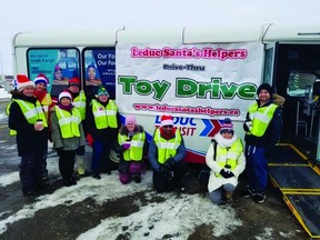 HAPPY HELPERS
The Leduc Santa's Helpers Drive-Thru Toy Drive brought in a steady stream of vehicles throughout the day on November 12, with 529 toys being collected. (Leduc Santa's Helpers)