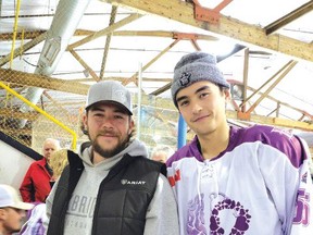 Photo supplied
Brandon Ormston stands next to Elliot Lake Red Wing Ryan Daponte. Ormston purchased Daponte’s jersy during the North Shore Cruisers silent auction for $500 and donated it to the Red Wing player’s parents.