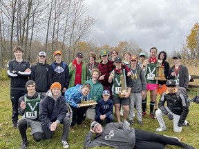 The Valour boys cross-country team celebrates its overall boys title victory at the 2022 UOVHSAA cross-country championship held at Hugli's Blueberry Ranch. Submitted photo