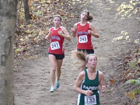 Ava Mark and Harmony Fowler of Jeanne-Lajoie competing at the EOSSAA cross-country championships held at the end of October at the Petawawa Golf Club.