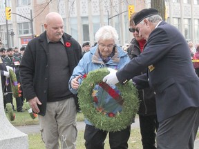 The2022  Silver Cross Mother for Branch 72 was Second World War veteran Connie Hodgson who served with the Canadian Women's Army Corps. In the photo she prepares to lay the wreath handed to her by Br. 72 President Stan Halliday. She was escorted by her son Ian, left, and her adopted daughter Jackie Lariviere. Anthony Dixon
