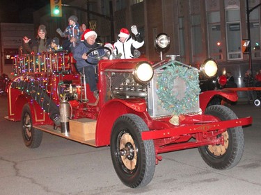 "Bertha" the Bickle fire truck that was Pembroke's first gas-fueled fire truck was all adorned in Christmas lights as she led one of the city's newer trucks in the Santa Claus Parade of Lights on Nov. 26. Bertha will turn 100 in 2023! Anthony Dixon