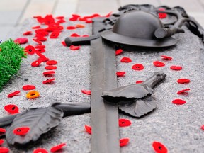 The Tomb of the Unknown Soldier in Ottawa covered in Remembrance Day poppies. Tony Ianiro / Getty Images