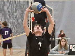 SDSS's Trent McKinley sets a pass against Listowel during the Huron-Perth senior boys' volleyball quarter-final Tuesday.