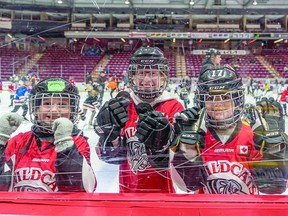 ROTARY FUNDRAISER U11 Wildcats hockey players Mikayla Miller, Dannika Backstrom and Mateja Tomas take part in the Bell Celebrity Skate with the Soo Greyhounds at the GFL Memorial Gardens last week. The event saw 470 participants raise $77,627 for Rotary youth projects, says a Rotary Sault media release. Soo Pee Wee Hockey League U10 player Rex Sinclair was the top fundraiser contributing over $1,400 on behalf of Rotary while the top fundraising team, the U11 Bulk Barn hockey team raised $4,719. BOB DAVIES