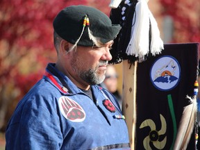 Shawn Osborne, who served in the Canadian Armed Forces and is chief instructor with the Sarnia Police Service, was part of the color guard Thursday at the Remembrance Day service held at the Aamjiwnaang First Nation cenotaph.