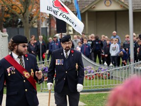 Petrolia Legion President Dennis Laker walks away after laying a wreath at the cenotaph during the Remembrance Day service Friday in Petrolia. (Terry Bridge/Sarnia Observer)