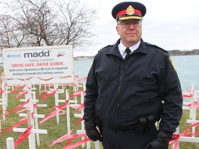 Sarnia Police Chief Derek Davis is shown at the MADD Sarnia-Lambton white cross display on the St. Clair Parkway.