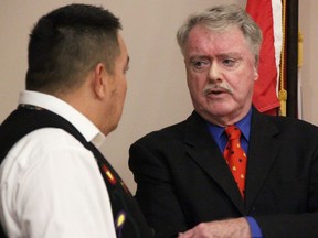 Aamjiwnaang First Nation Chief Chris Plain, left, and Sarnia Mayor Mike Bradley speak at the 2022-2026 Sarnia city council inaugural meeting Nov. 15, 2022. (Tyler Kula/ The Observer)