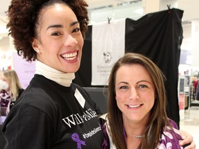 Board vice-chair Dorian Noble, left, and fundraising and marketing coordinator Josephine Ethier with the Women's Interval Home of Sarnia-Lambton poses at Lambton Mall during the home's Walk a Mile event Nov. 19, 2022. (Tyler Kula/ The Observer)
