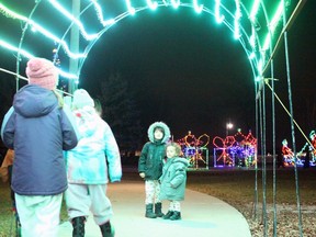 Charlie Menzies, 5, and Matthew Menzies, 2, from Sarnia check out the Sarnia-Lambton's Celebration of Lights Saturday night.  Terry Bridge/Sarnia Observer/Postmedia Network