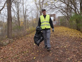 Terry Bonnett, president of the Waterford Heritage Trail Association, joined Saturday's Cleaning Up Norfolk event in Waterford Saturday morning hosted by Long Point Biosphere Region.  CHRIS ABBOTT