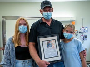 The re-opening of the Norfolk General Hospital labour and delivery unit was dedicated to registered nurse Shannon Adams, who died of cancer early this year. Her husband Brad Adams and daughters Abby and Emma were on hand for the opening ceremony. CONTRIBUTED