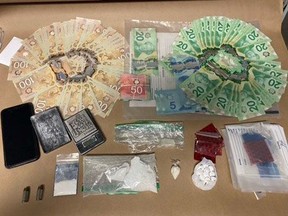 Police seized illegal drugs, cash and ammunition after executing a search warrant on Talbot Street South in Simcoe on Wednesday. NORFOLK OPP TWITTER